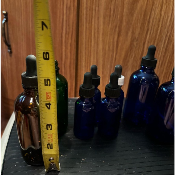 8 Bottles 4 Small 4 large - Picture 4 of 5